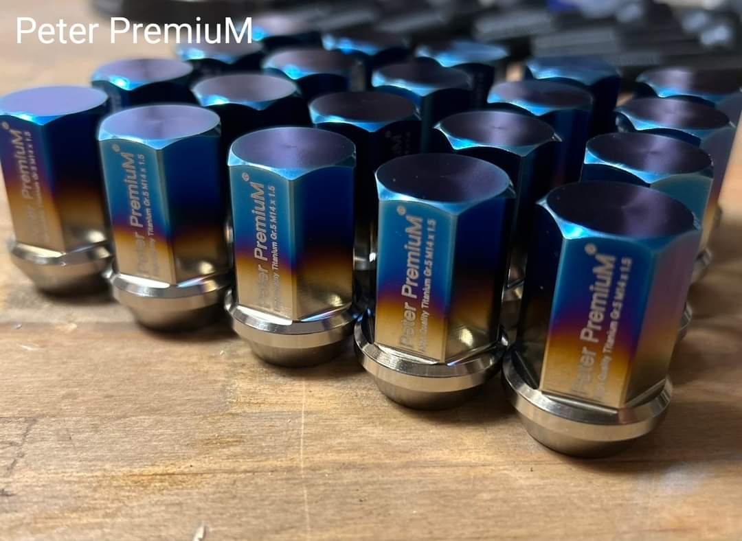 Peter PremiuM - Titanium Gr.5 ( Ti 6AL4V) Extremely light weight  Wheel nuts for Tesla. M14 x 1.5 conical seat Length 35mm.