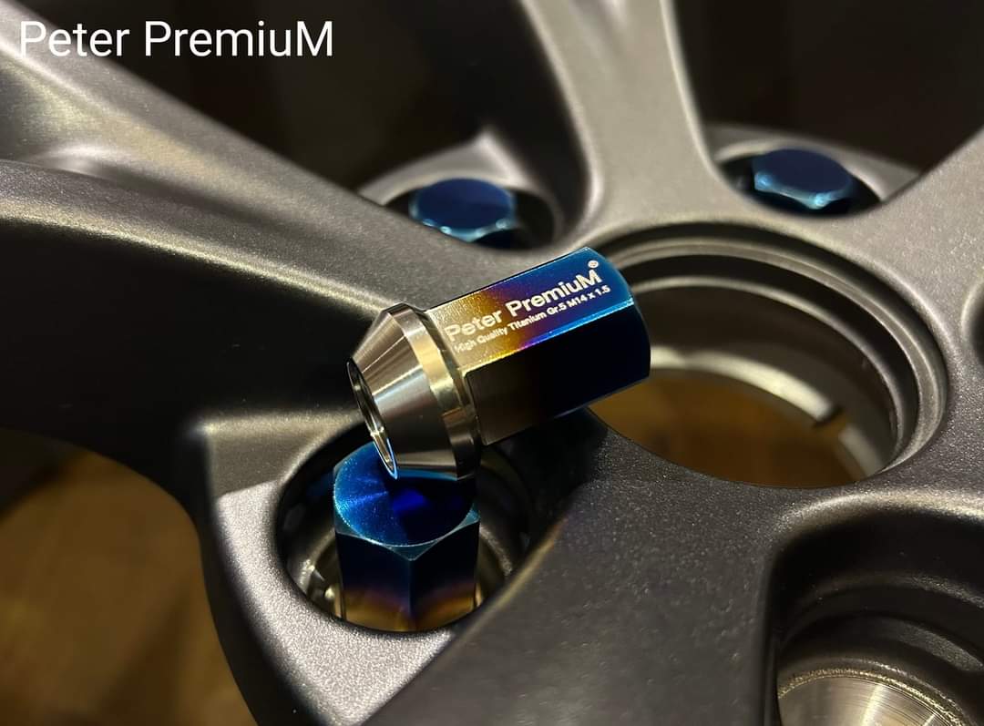 Peter PremiuM - Titanium Gr.5 ( Ti 6AL4V) Extremely light weight  Wheel nuts for Tesla. M14 x 1.5 conical seat Length 35mm.