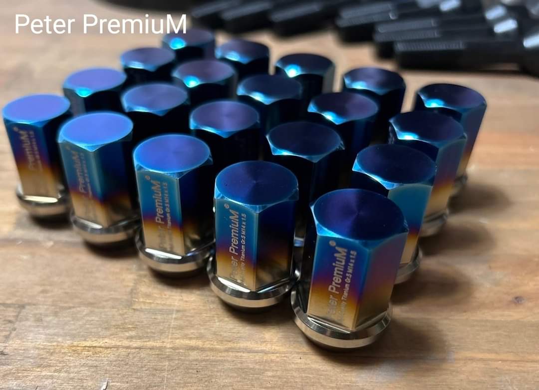 Peter PremiuM - Titanium Gr.5 ( Ti 6AL4V) Extremely light weight  Wheel nuts for Tesla. M14 x 1.5 conical seat Length 35mm.