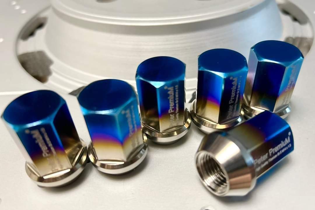 Peter PremiuM - Titanium Gr.5 ( Ti 6AL4V) Extremely light weight  Wheel nuts for Tesla. M14 x 1.5 conical seat Length 35 mm.